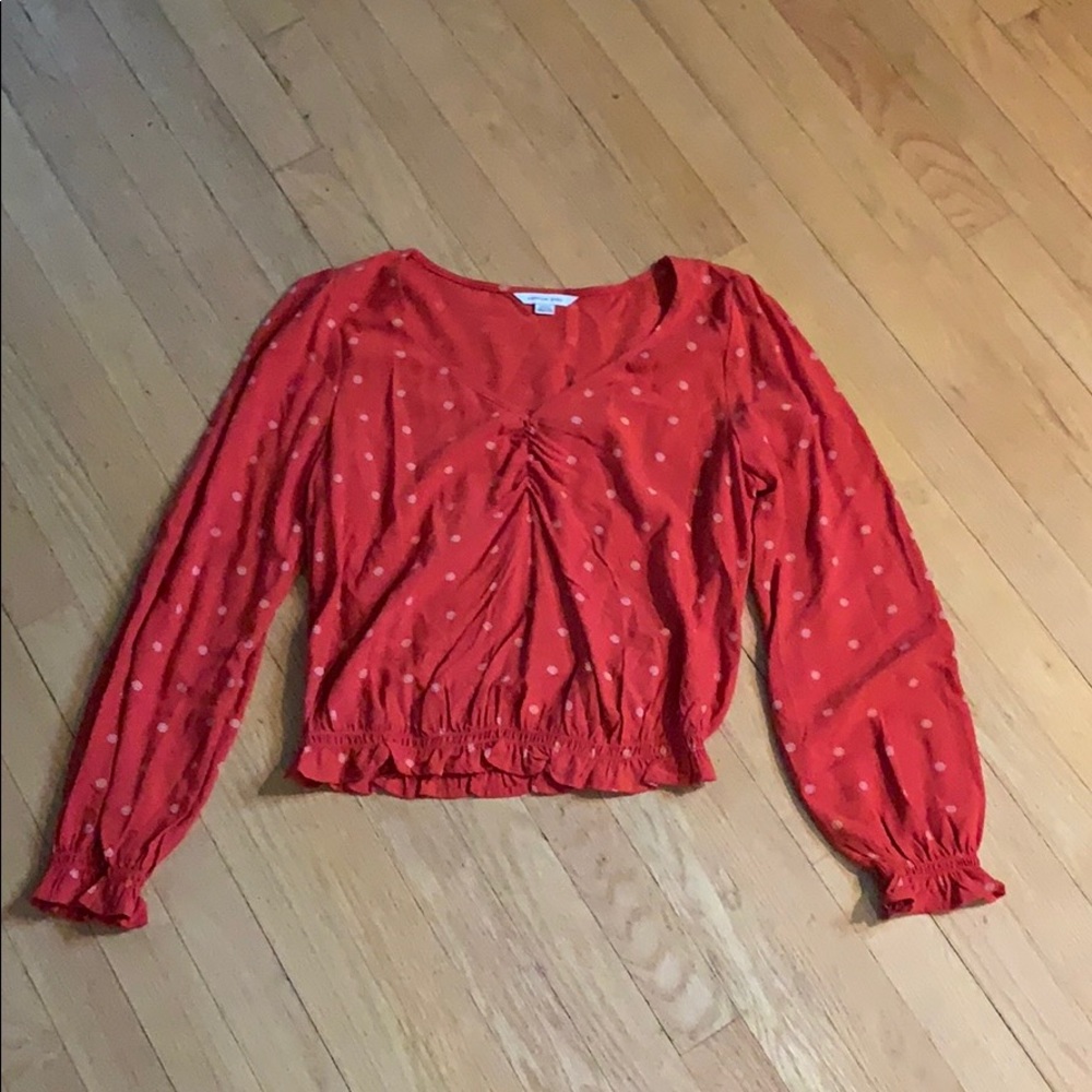 Coral blouse with white little flowers